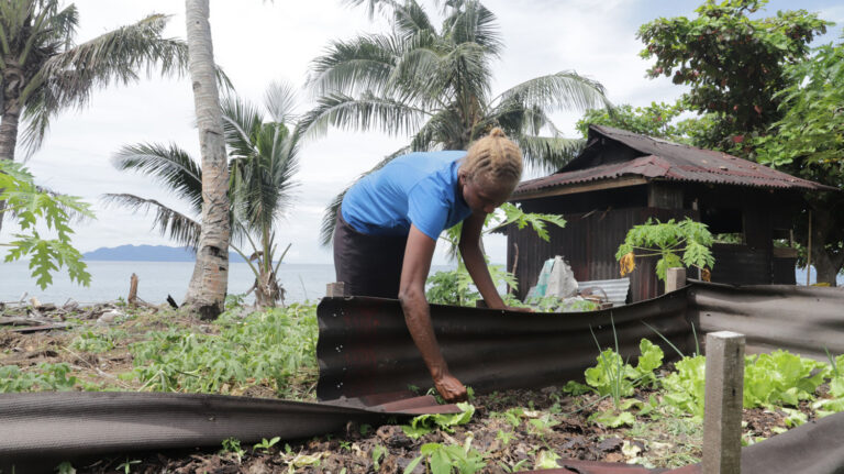 Drowning in debt and rising seas